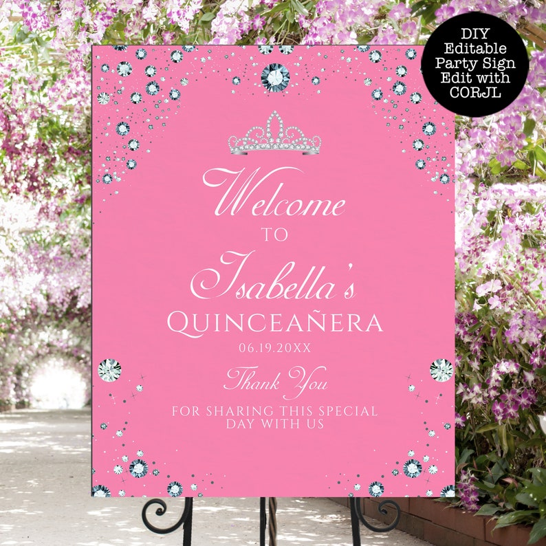 May include: Pink welcome sign with a silver crown and glitter for a Quincea&ntilde;era. The sign says "Welcome to Isabella's Quincea&ntilde;era 06.19.20XX Thank You for sharing this special day with us".