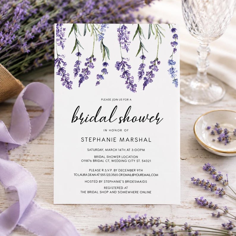 May include: A white rectangular bridal shower invitation card featuring a watercolor illustration of purple lavender sprigs at the top. The text reads: PLEASE JOIN US FOR A bridal shower IN HONOR OF STEPHANIE MARSHAL SATURDAY, MARCH 14TH AT 3:00PM.