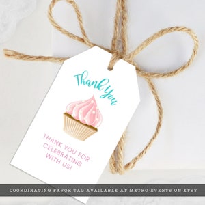 May include: White tag with a pink cupcake illustration and the words "Thank You" in teal script. The tag also reads "Thank You For Celebrating With Us!" and is tied with a natural twine bow, perfect for party favors.