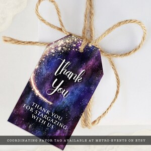 Night under the stars, galaxy-themed favor tag. This design is created with a star-filled purple and blue starry sky background with a half-ring of shooting stars training through it. Designed by MetroEvents.