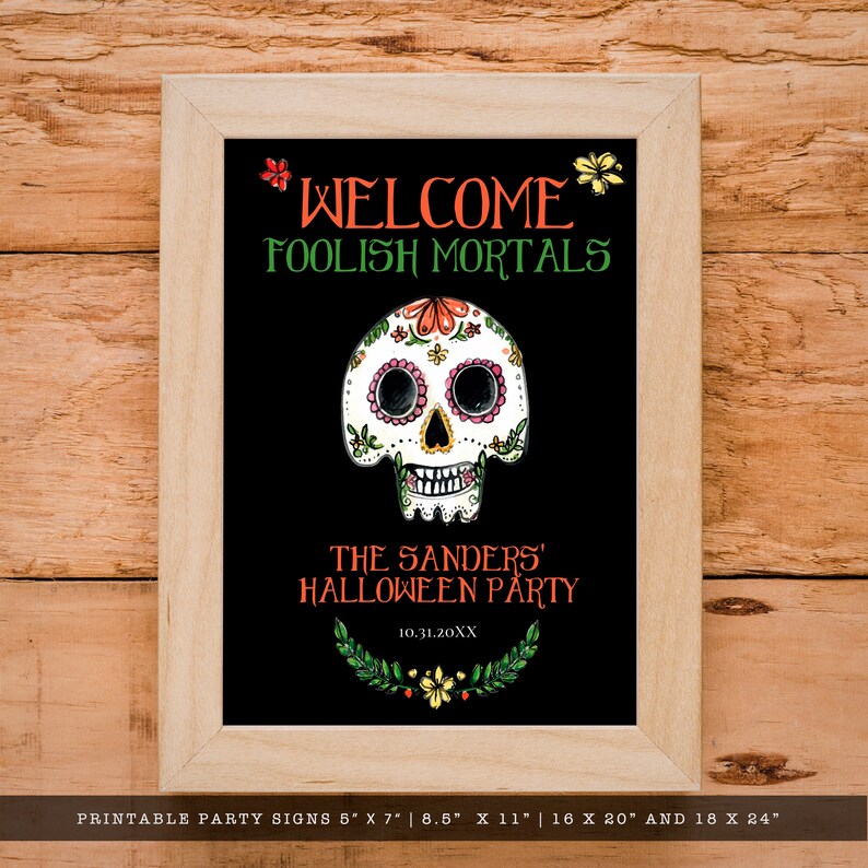 Day of the dead themed welcome sign a watercolor-style sugar skull with flower and leaf accents on a black background. Designed By MetroEvents