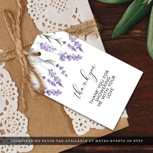 May include: A white thank you tag with a watercolor illustration of lavender flowers. The text reads "Thank you for showering me with your love".