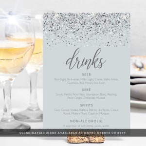Sparkling Silver Glitter Bar Menu Signs. A glam style sign is created with faux silver glitter on a coordinating silver background with elegant text. Designed By MetroEvents.