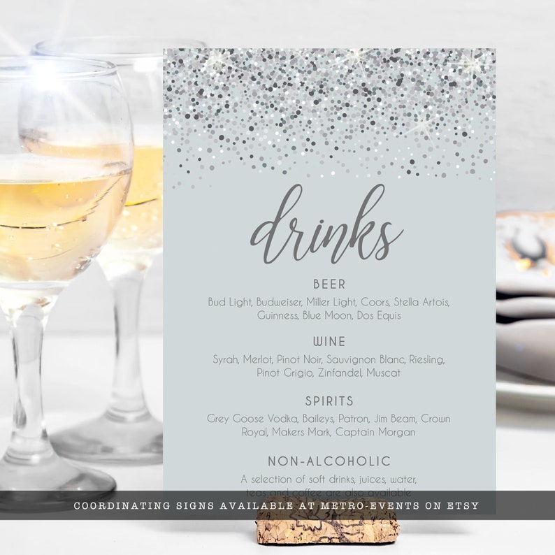 Sparkling Silver Glitter Bar Menu Signs. A glam style sign is created with faux silver glitter on a coordinating silver background with elegant text. Designed By MetroEvents.