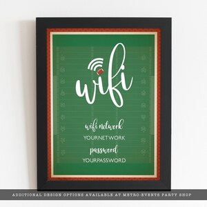 May include: A framed sign featuring a green football field graphic with white yard lines and numbers. The text reads wifi, wifi network, YOURNETWORK, password, and YOURPASSWORD. A small football icon replaces the dot in the wifi symbol.