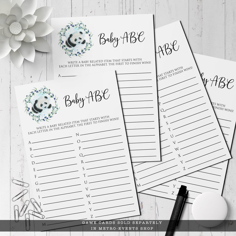May include: Baby ABC game cards with a panda bear illustration and text. The cards have lines for writing baby-related items for each letter of the alphabet. The text reads, "Write a baby related item that starts with each letter in the alphabet. The first to finish wins!"