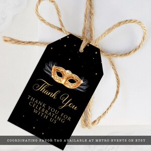 May include: Black and gold thank you tag with a gold masquerade mask and the text "Thank You" and "Thank you for celebrating with us".