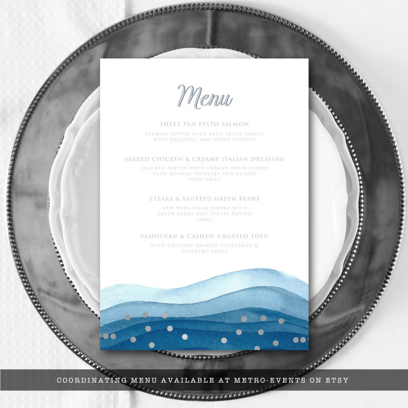 May include: A white menu card with a watercolor wave design in shades of blue and silver dots. The word "Menu" is written in a script font. The menu lists several dishes, including salmon, chicken, steak, and tofu. The text "COORDINATING MENU AVAILABLE AT METRO-EVENTS ON ETSY" is at the bottom.
