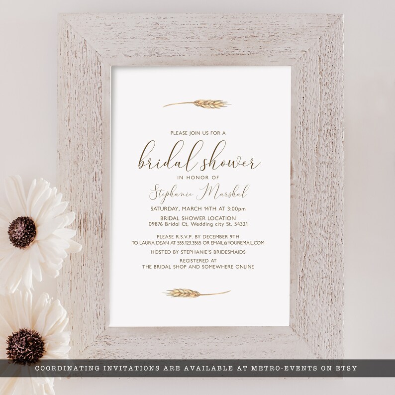 May include: A white bridal shower invitation with gold wheat stalks and calligraphy text. The invitation reads "Please join us for a bridal shower in honor of Stephanie Marshal. Saturday, March 14th at 3:00pm. Bridal Shower Location 09876 Bridal Ct, Wedding city St. 54321. Please R.S.V.P. by December 9th to Laura Dean at 555.123.3565 or email@youremail.com. Hosted by Stephanie's Bridesmaids. Registered at The Bridal Shop and Somewhere Online."