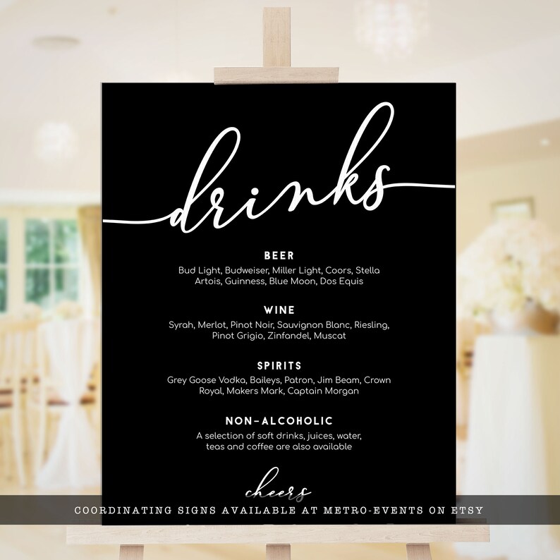 May include: Black and white sign with the word "drinks" in cursive script. The sign lists various beer, wine, and spirit options, as well as non-alcoholic beverages. The sign also includes the text "cheers" and "COORDINATING SIGNS AVAILABLE AT METRO-EVENTS ON ETSY".
