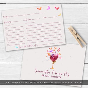 May include: A printable recipe card template with a watercolor design of a wine glass with butterflies. The card has space for the recipe name, servings, cook time, ingredients, instructions, and a space to write "from the kitchen of:". The card also includes the text "Samantha Cromwell's Bridal Shower".