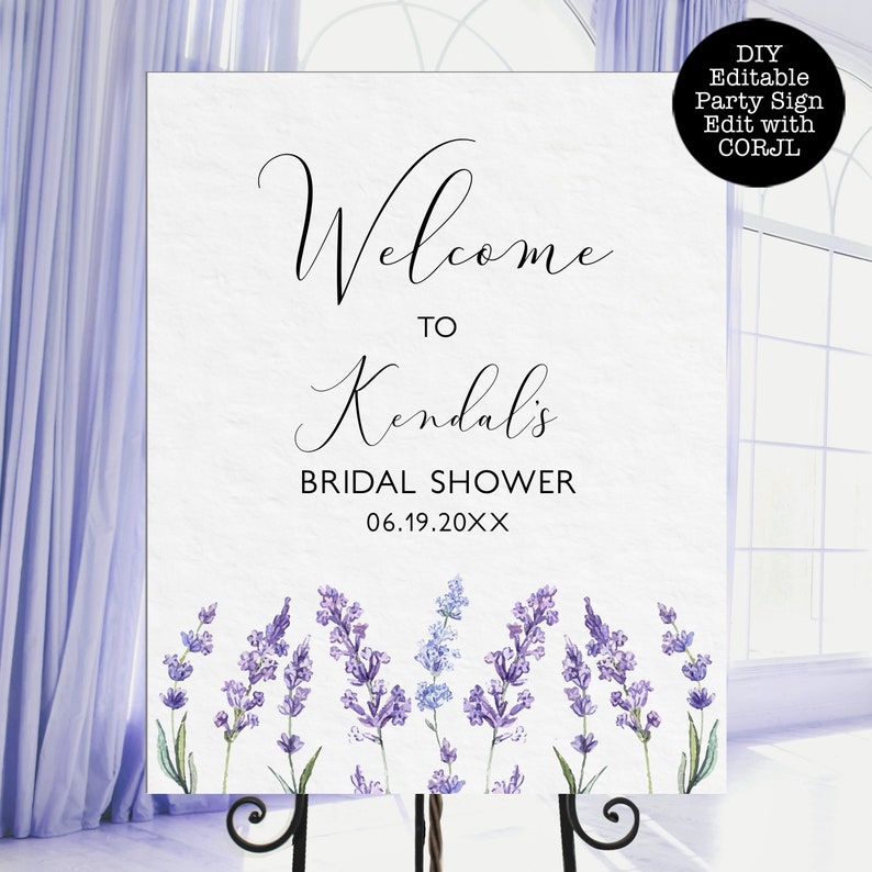 May include: A white welcome sign with lavender floral accents. The sign reads "Welcome to Kendall's Bridal Shower 06.19.20XX".