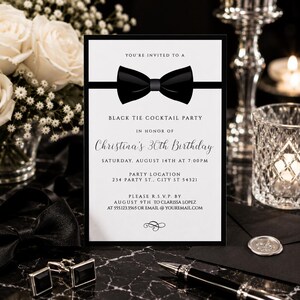 May include: A rectangular invitation card with a white background and black border. It features a black bow tie graphic at the top and text reading: You're invited to a Black Tie Cocktail Party in honor of Christina's 30th Birthday, Saturday, August 14th at 7:00pm.