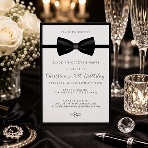 May include: A rectangular invitation card with a white background and a black border. The card features a black bow tie graphic at the top, followed by the text: YOU'RE INVITED TO A BLACK TIE COCKTAIL PARTY IN HONOR OF Christina's 30th Birthday.