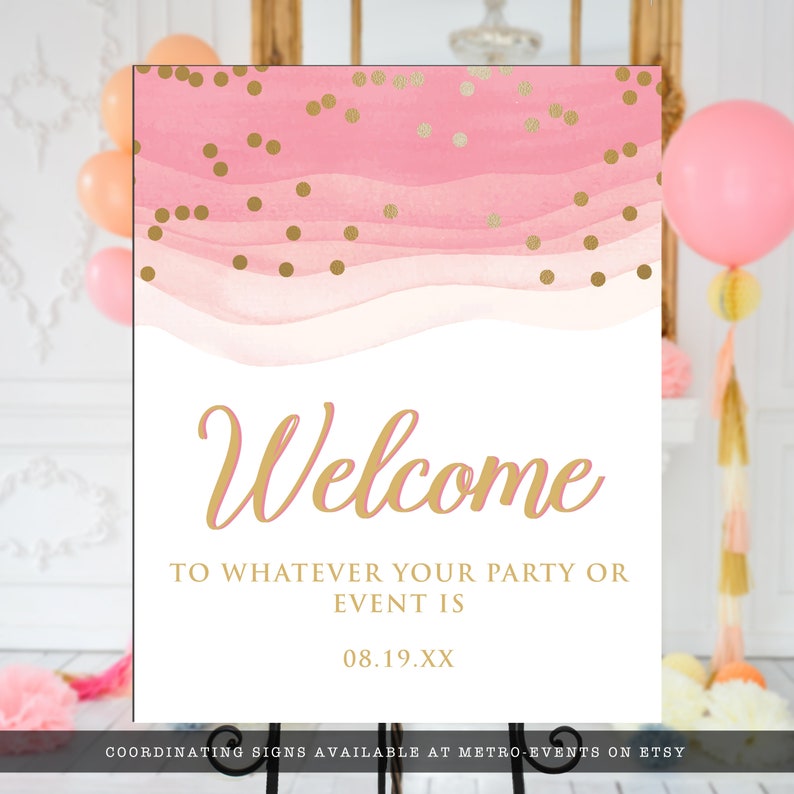 May include: A pink and gold welcome sign with the word "Welcome" in elegant gold script. The sign has a watercolor-style pink background with gold confetti and the text "TO WHATEVER YOUR PARTY OR EVENT IS" and "08.19.XX".