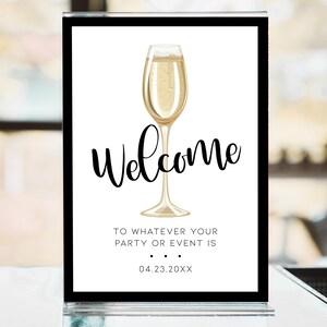 Champagne Brunch, Champagne Themed Welcome sign. Created with a gold champagne glass with a white background and black outline. Designed By MetroEvents