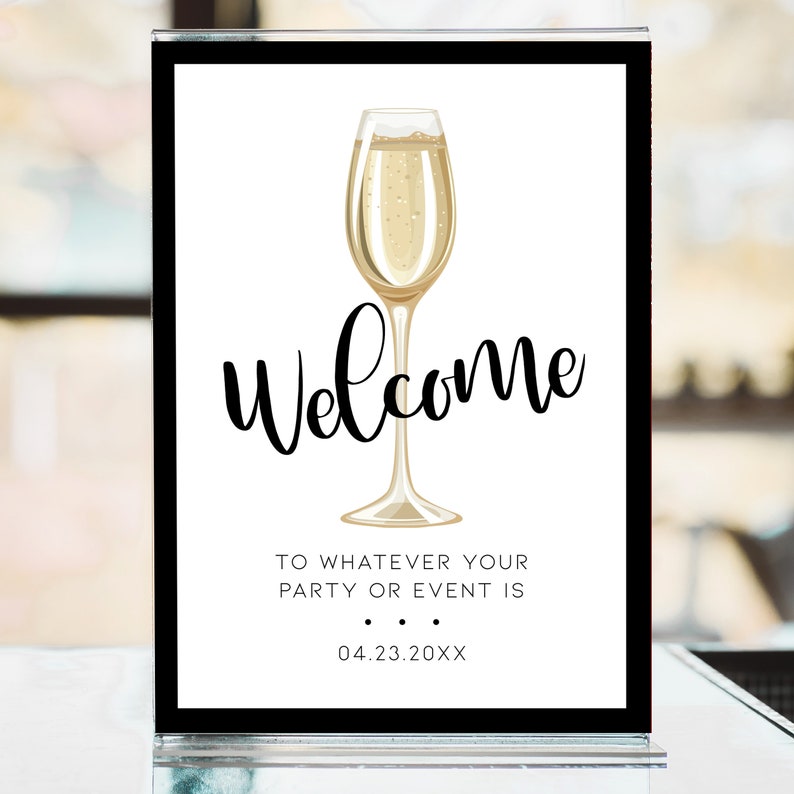 Champagne Brunch, Champagne Themed Welcome sign. Created with a gold champagne glass with a white background and black outline. Designed By MetroEvents