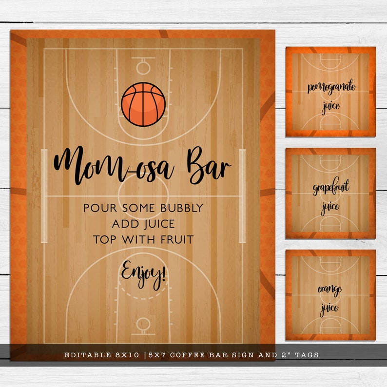 May include: A basketball court themed sign and three smaller tags with a wood grain background. The large sign features a basketball graphic and the text Mom-osa Bar, Pour some bubbly, Add juice, Top with fruit, Enjoy. The tags read pomegranate juice, grapefruit juice, and orange juice.