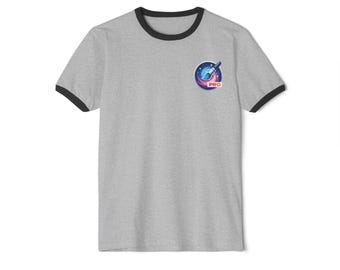 May include: A gray ringer t-shirt with black trim around the collar and sleeves. A colorful circular graphic featuring a rocket ship and the word "PRO" is on the left chest. The shirt is made of a soft material.