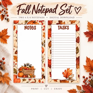 May include: A digital download set of two 10.16 x 20.32 cm notepads featuring a fall theme with autumn leaves, pumpkins, and berries. One notepad is labelled Notes with a raccoon in a crate, and the other is labelled Tasks with a small animal holding a leaf.