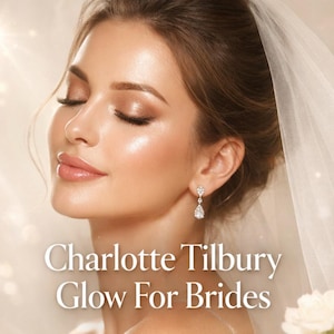 May include: A woman with glowing skin and closed eyes, wearing a veil and drop earrings. The image features the text "Charlotte Tilbury Glow For Brides" in white, promoting bridal makeup.