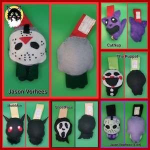 May include: A collection of handmade felt ornaments featuring horror movie characters. Includes Jason Voorhees, CatNap, The Puppet, MothMan, GhostFace, and Jason Voorhees (8-bit). Each ornament has a tag attached.