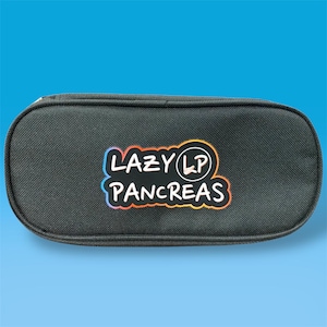 May include: A black oval-shaped zippered pencil case featuring a central graphic patch with the text "LAZY PANCREAS" and a circular "LP" logo. The text and logo are outlined in a vibrant gradient of blue, purple, and orange colors.