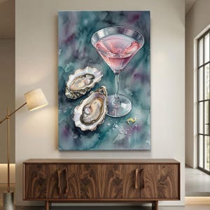 Puede incluir: Pintura a la acuarela de un cóctel rosa en una copa de Martini, con dos ostras abiertas y una rodaja de limón. El fondo es una mezcla de tonos turquesa, morado y azul, creando una composición artística sofisticada. Bodegón.