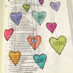 Custom Bible with painted Bible art pages.