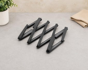 Expandable Trivet for Hot Pots and Pans, Black Metal Foldable Trellis Trivet, Adjustable Kitchen Table Protector, Modern Pot Holder Rack