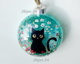 Cat Christmas Ornament: Black cat with flower ornament, round shaped, handpainted xmas Blue Glass ball