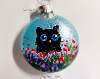 Cat Christmas Ornament: Black kitty with flower ornament, round shaped, handpainted xmas Blue Glass ball