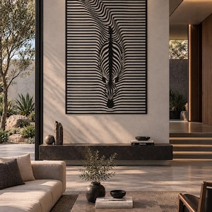 May include: A rectangular black wall art piece featuring a three-dimensional optical illusion of a zebra head emerging from horizontal slats. The design uses negative space and layered lines to create a depth effect on a light-coloured wall.