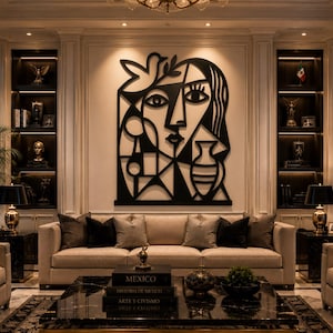 May include: A large black metal wall art piece featuring a stylized cubist portrait of a face with a bird and a vase, mounted on a light-colored wall above a beige sofa in a living room setting with dark marble tables and decorative shelving.