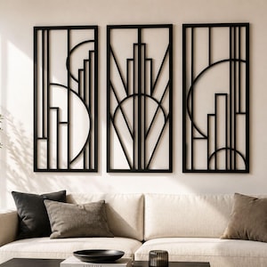 May include: A set of three rectangular black wall panels featuring geometric patterns with vertical lines and circular arcs. Each panel is framed in black and displays a symmetrical arrangement of straight bars and curved segments in a linear design.