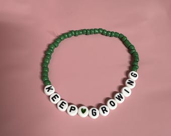 Pulsera de cuentas "Sigue creciendo"