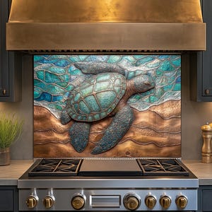 May include: A kitchen with dark gray cabinets and a stainless steel stove. Above the stove is a copper range hood and a decorative tile backsplash featuring a sea turtle in shades of blue and green.