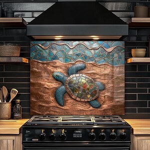 May include: A copper-colored kitchen backsplash featuring a detailed relief of a sea turtle. The turtle has a mosaic-style shell with blue and green accents. The top of the backsplash depicts waves in shades of blue and turquoise.