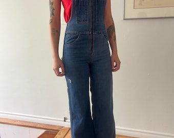 Peto vintage de los años 70 con pantalones acampanados y forro de cuadros.