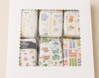 Deluxe Diaper Sampler Box | 48 Size 1 Diapers, 6 Brands, 6 Packs of Wipes