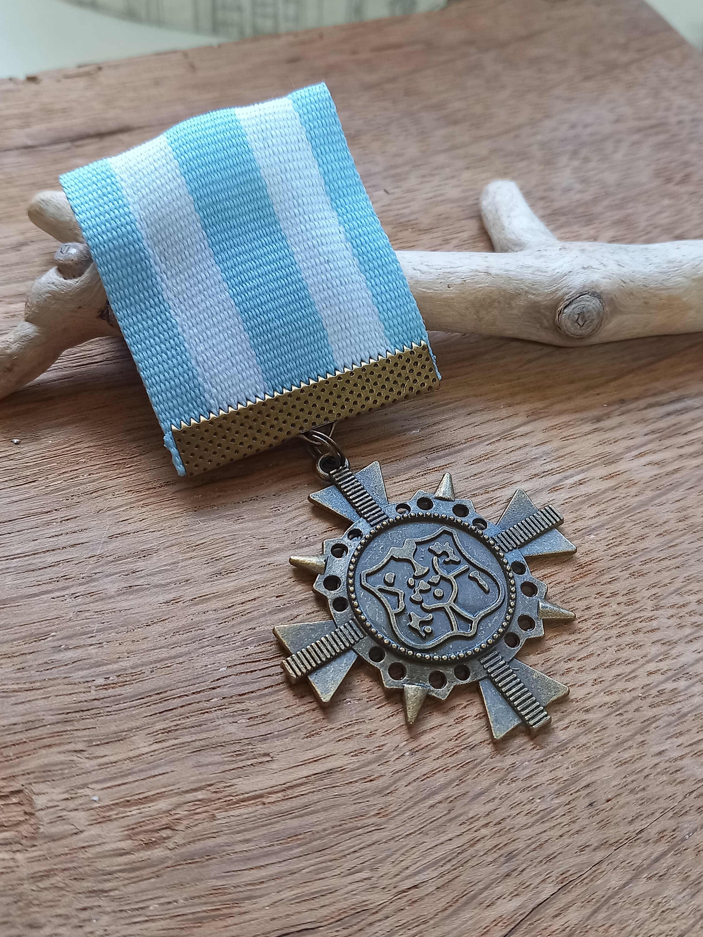 Military style , Steampunk ,Faux military medal with blue and white ribbon