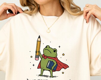 We Test At Dawn Frog Teacher Shirt, Funny Test Day Teacher Tee, Cute Classroom Humor Shirt, Exam Day Outfit, Unisex Teacher Gift