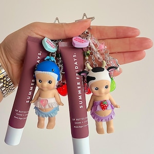 Chaveiros de protetor labial Sonny Angel