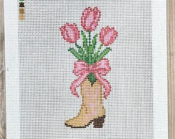 Ricamo su tela con fiori rosa e stivali da cowboy