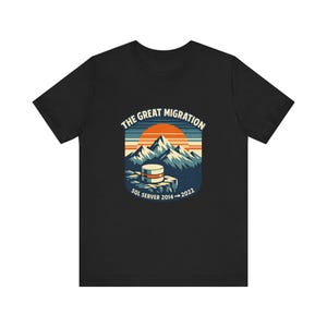 May include: Black t-shirt featuring a graphic design with the text "THE GREAT MIGRATION" above a mountain scene with a sunset and a database server. The text "SQL SERVER 2014-2022" is below the graphic.