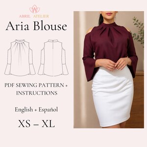 May include: A burgundy cold-shoulder blouse with a high neckline, pleated front, and bell sleeves. The image includes text reading ABRIL ATELIER Aria Blouse PDF SEWING PATTERN + INSTRUCTIONS English + Español XS – XL and a line drawing of the garment.