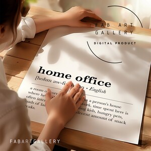May include: A white printable poster with the word "home office" defined as "a room or corner in a person's house where work, time spent here is often interrupted by playing kids, hungry pets, a decent amount of snack breaks."