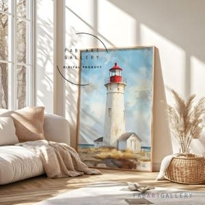 May include: A framed digital art print of a lighthouse with a red top and white tower, set against a blue sky with clouds. The lighthouse is on a rocky shore with a small building. The text "FAB ART GALLERY DIGITAL PRODUCT" is visible.