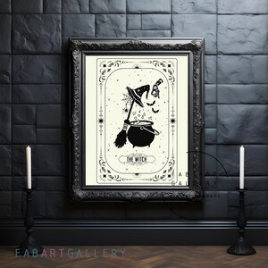 May include: Black and white illustration of a witch with a cauldron, broom, and bats. The text "THE WITCH" is below the image. The illustration is framed in a black frame.
