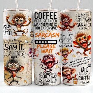 May include: Three stainless steel tumblers with humorous monkey graphics and sarcastic quotes. The tumblers feature phrases like "Coffee because anger management is too expensive" and "Sarcasm served daily."